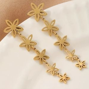 NWT Gold Plated Stainless Steel drop earrings. Lazer flowers. Pretty In gift 🎁